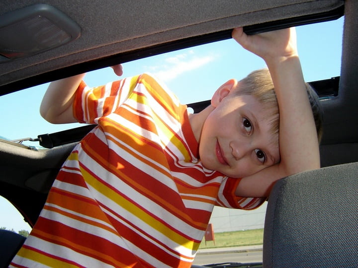 http://pixabay.com/photos/boy-orange-child-happy-car-478187/