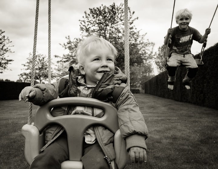 http://pixabay.com/photos/swing-kids-boys-little-happy-fun-932249/